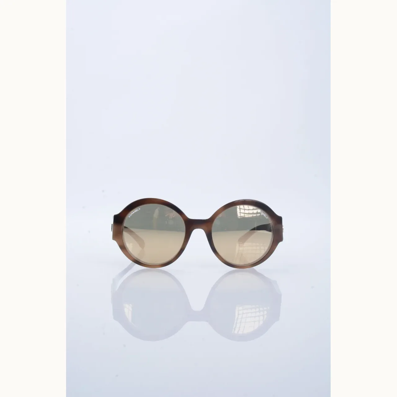 Chanel Round Logo Carey