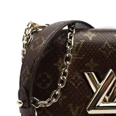 Louis Vuitton Twist Leather Reptil Handbag