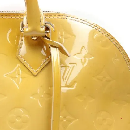 Louis Vuitton Alma Monogram Handbag