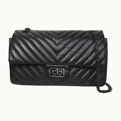Bolso Chanel Classic Flap Reissue 2.55